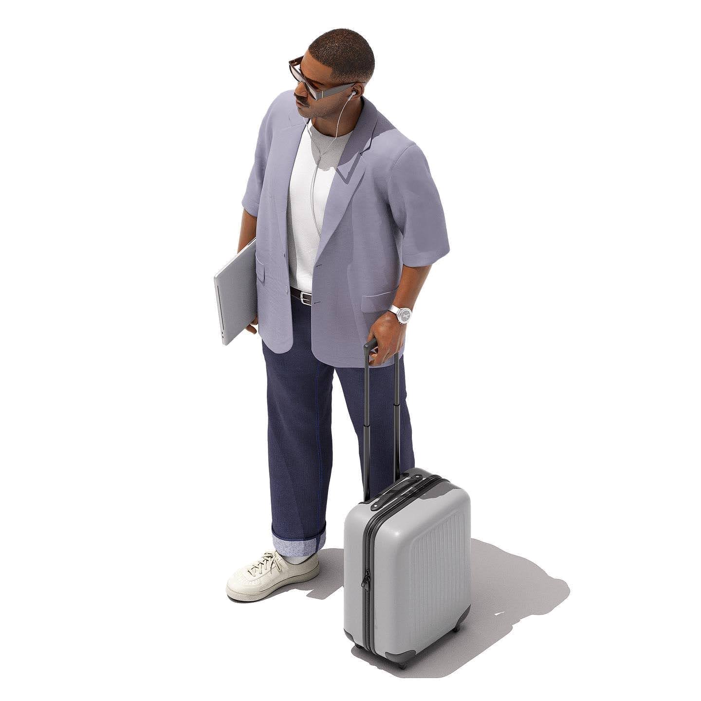 A person with a laptop and a rolling suitcase, on the move between workplaces